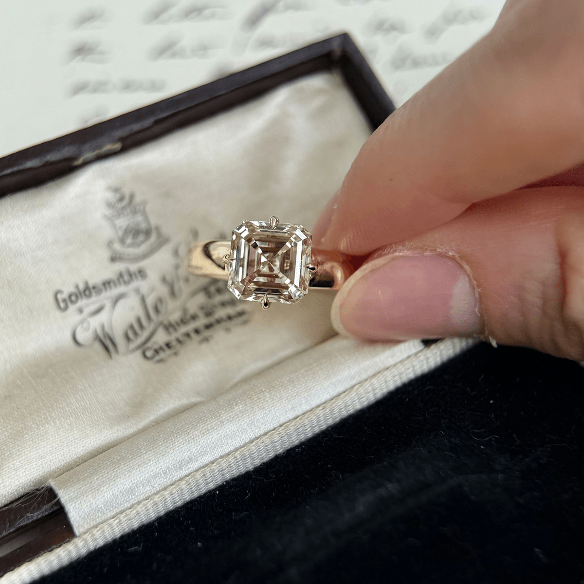 Sintra-Champagne Asscher Cut Lab Grown Diamond Ring presented in a luxurious box, showcasing its elegant design.