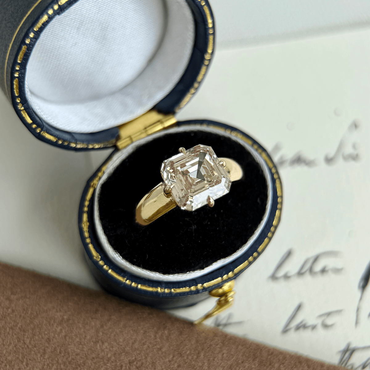 Sintra-Champagne Asscher Cut Lab Grown Diamond Ring in elegant ring box showcasing the unique champagne diamond.