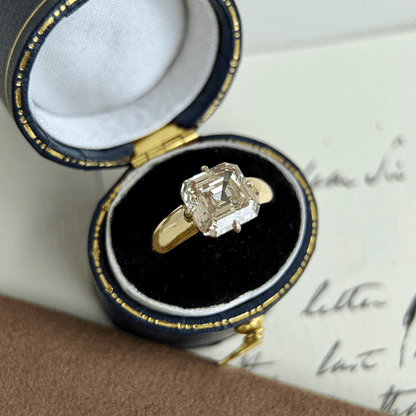 Sintra-Champagne Asscher Cut Lab Grown Diamond Ring in elegant ring box showcasing the unique champagne diamond.