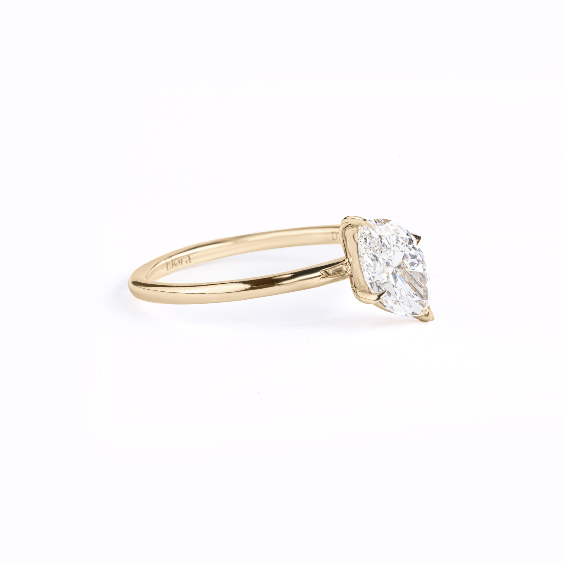 Angled View Tilted Marquise Cut Lab Diamond Solitaire Ring with four-prong setting