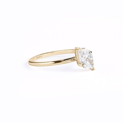 Angled View Tilted Marquise Cut Lab Diamond Solitaire Ring with four-prong setting
