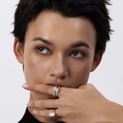 Front view of Mira Tilted Oval cut lab-grown diamond solitaire ring in 14K yellow gold