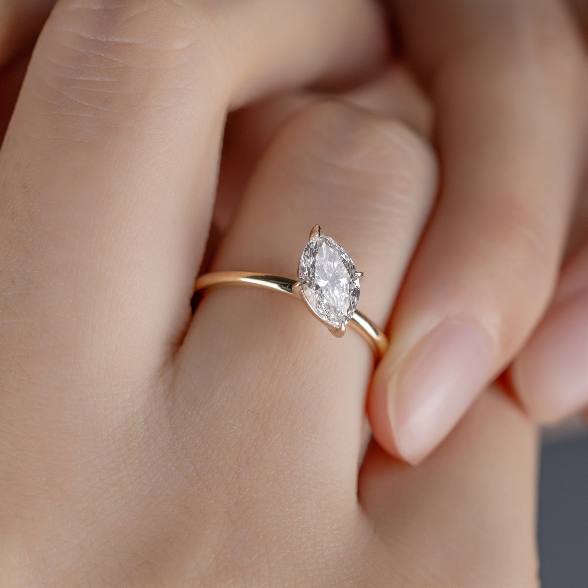 Close-up detail Tilted Marquise Cut Lab Grown Diamond Engagement Ring