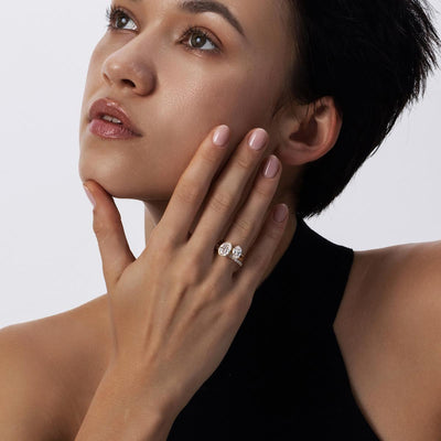 Aria ring front view with tilted oval cut lab-grown diamond in 14K yellow gold