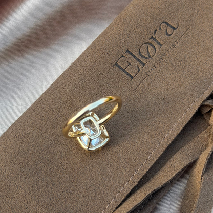 Eliza-Old Mine Cut Lab Grown Diamond Engagement Ring displayed on a soft fabric surface.