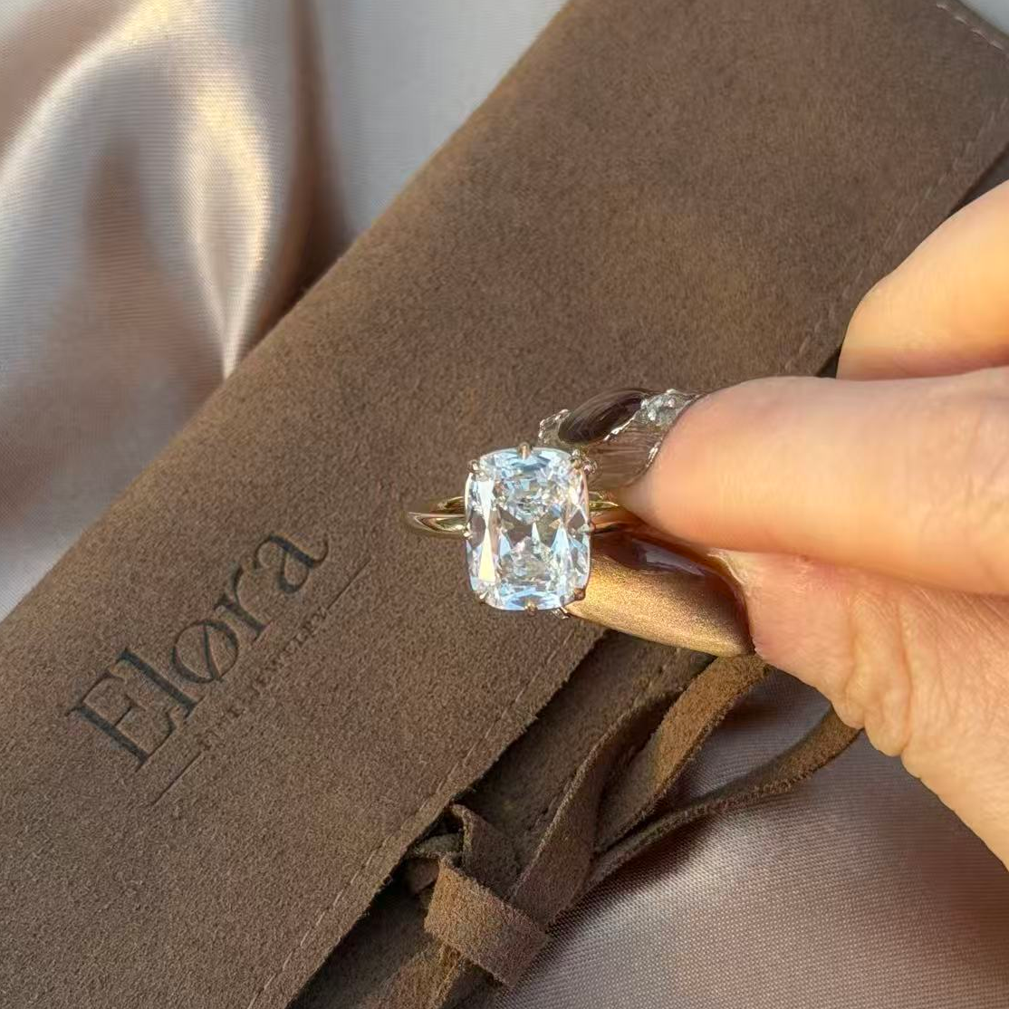 Eliza-Old Mine Cut Lab Grown Diamond Engagement Ring showcased on a hand, beside an Elora branded box in soft lighting.