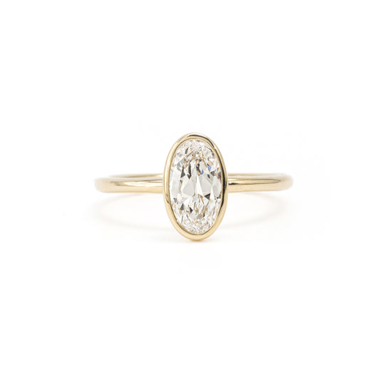 Face view Nova Oval Cut Lab Grown Diamond Bezel Ring in 14K Gold
