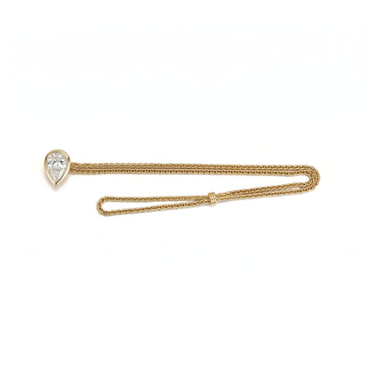 Faith-Pear Cut Lab Grown Diamond Bracelet showcasing a pear-cut diamond set on a handwoven 18K gold chain.
