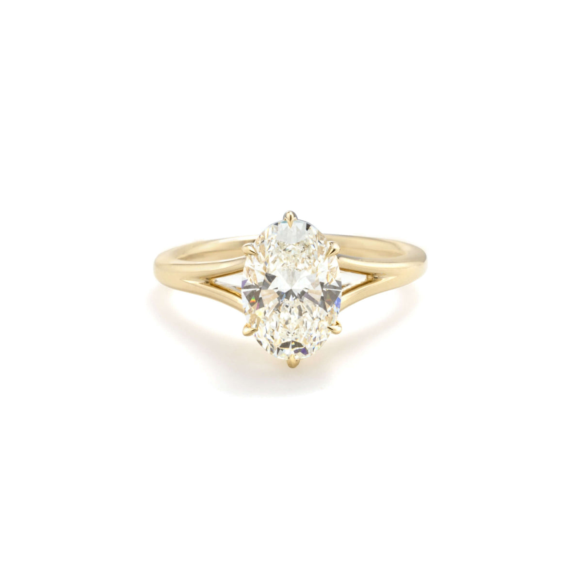 Front-facing view of Edith oval lab diamond ring in 14K yellow gold, showing elegant solitaire setting