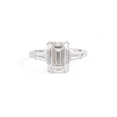 Front View Three Stone Emerald Cut Lab Grown Diamond Engagement Ring in platinum