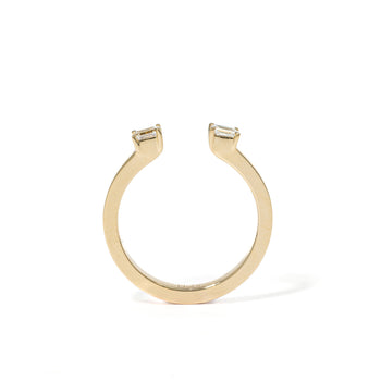 Front view Billie open band with two emerald-cut lab-grown diamonds in yellow gold