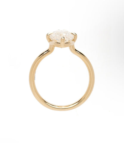 Custom Oval Cut Diamond Ring Setting in 14K yellow gold with a clean halo-free design.