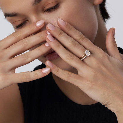 Hand-closeup of 2.09ct Radiant Cut Diamond Ring Stacked with a slim pavé band
