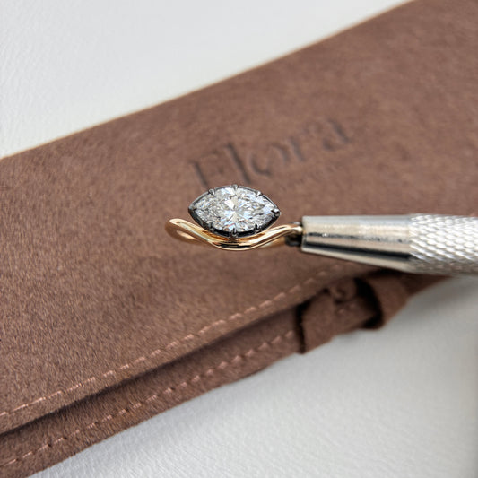 Eva-1ct Marquise Cut Lab Grown Diamond Pinky Ring showcased with black gold bezel and 14K yellow gold band.