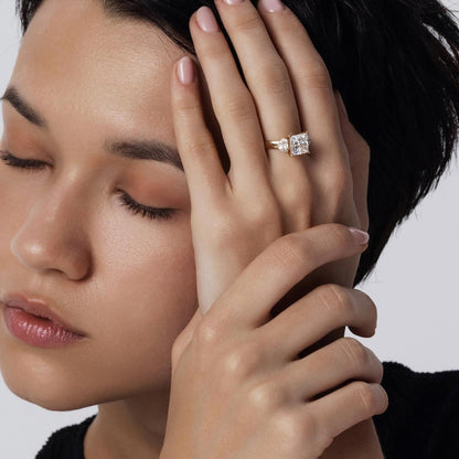 Model hand wearing Princess Cut Lab Grown Diamond Three-Stone Engagement Ring in minimalist style