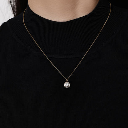 Model wearing A Halo Round Cut Diamond Pendant Necklace 7.9×9.8×5 mm Pendant dimensions