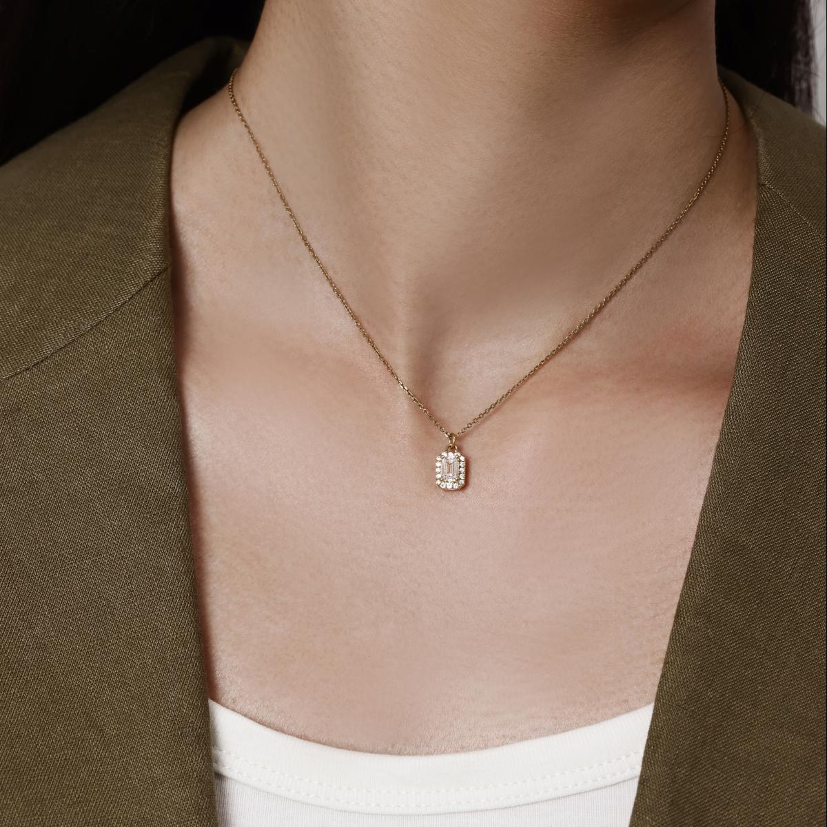 Model wearing a Halo Emerald Cut Diamond Pendant Necklace 7.3×10.4×5mm Pendant dimensions
