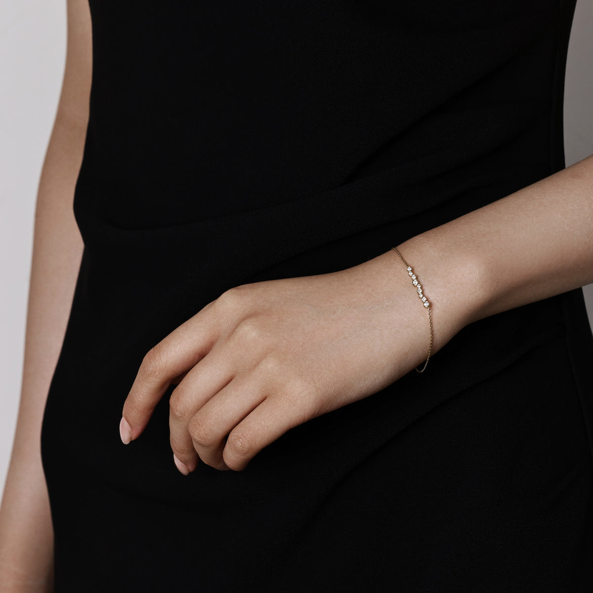 Model wearing a Mixed Bezel set Round Diamond Bracelet 6.5" Bracelet Length (165mm)