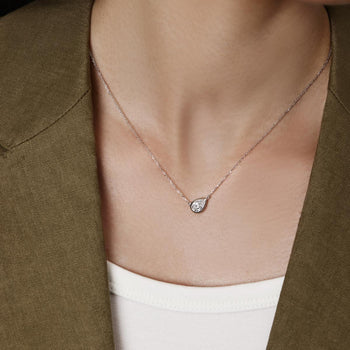 Face view Tilted 0.76ct Pear Cut Diamond Necklace in Platinum Bezel | Nevaeh | Elora