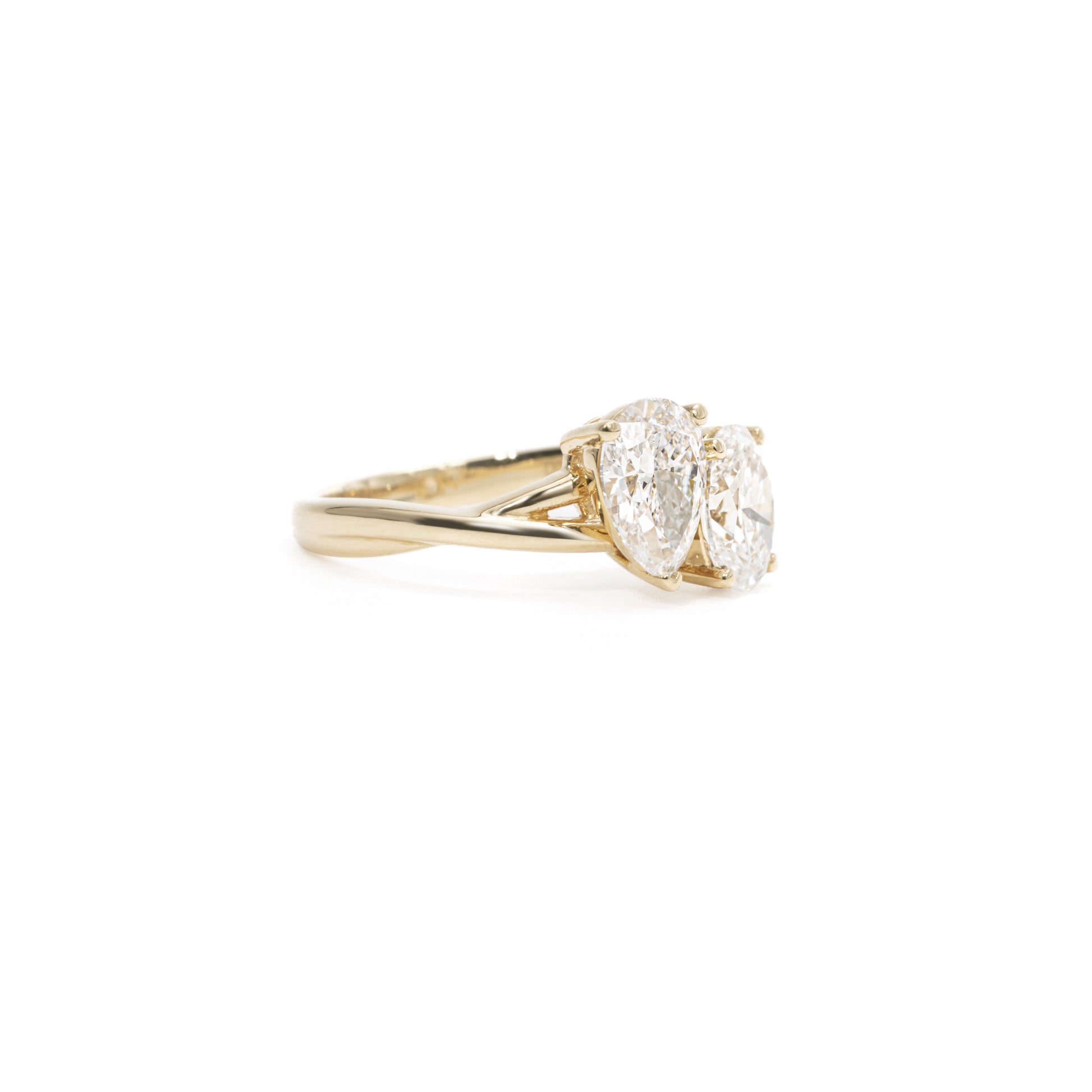 Side profile highlighting Ivy Pear and Oval Cut Diamond Ring