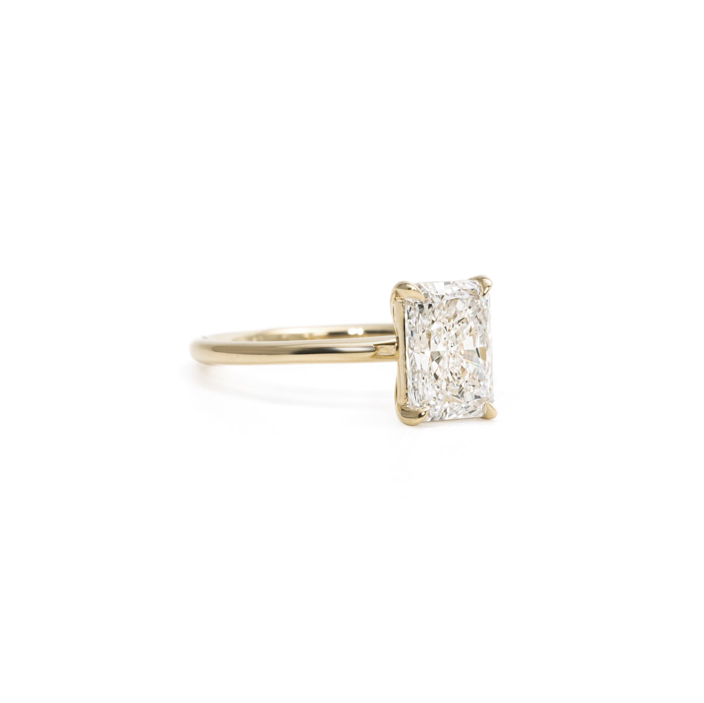 Side profile of Radiant Cut Lab Grown Diamond Ring in four-prong setting