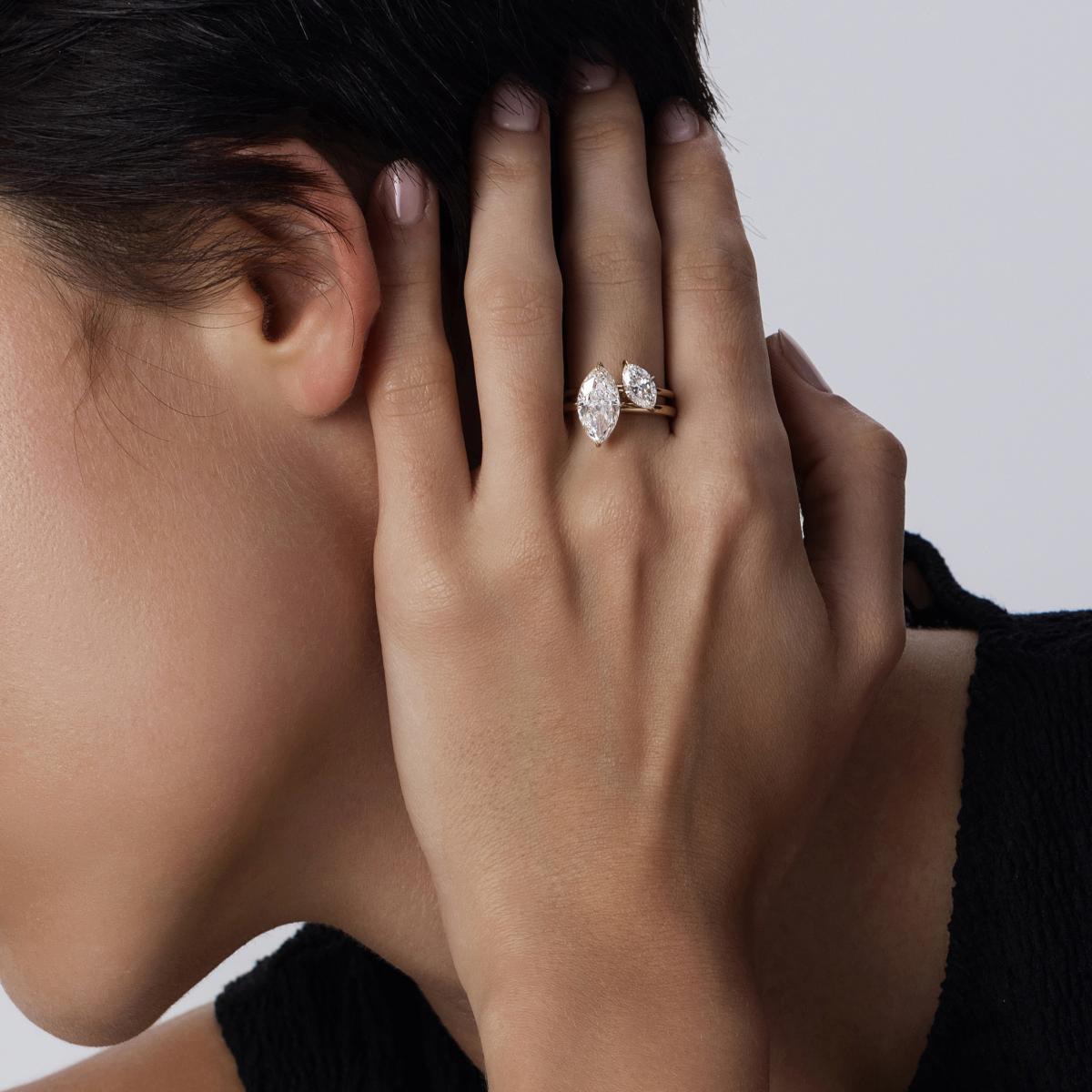 Stacked look featuring Marquise Cut diamond ring paired with a Tilted Marquise-cut solitaire