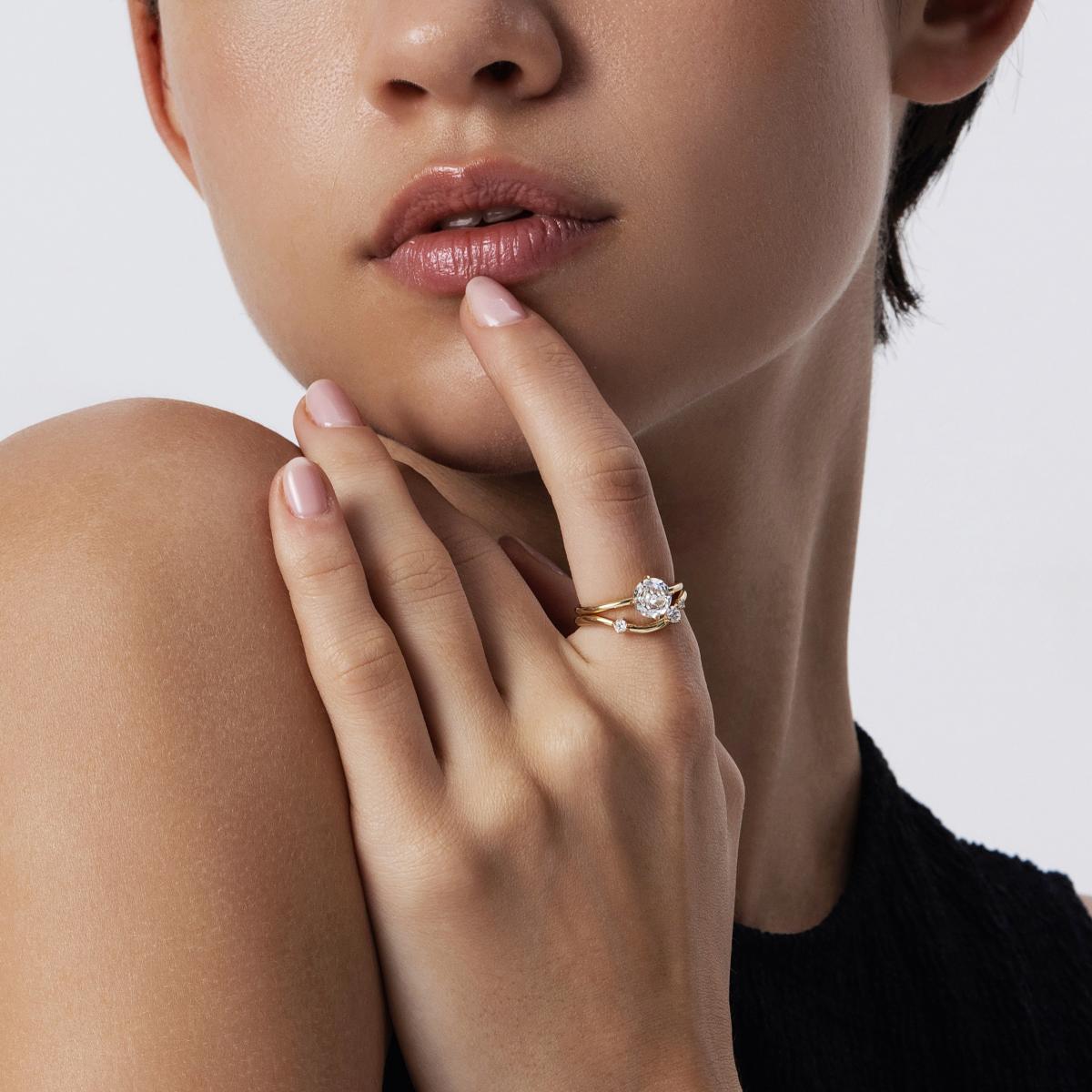 Stacked look featuring Round Rose-cut diamond ring paired with a wave wedding band