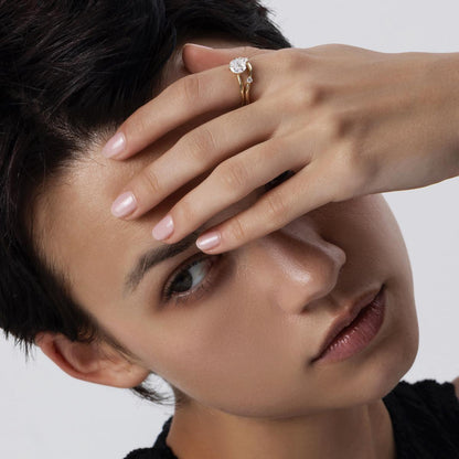 Stacked ring look featuring a Rose-cut diamond ring and a delicate contour band in yellow gold