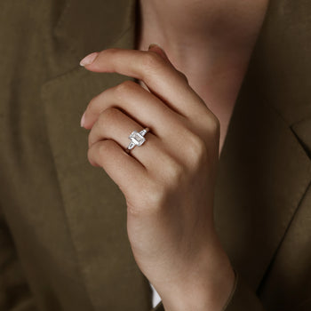 Front View Three Stone Emerald Cut Lab Grown Diamond Engagement Ring in platinum