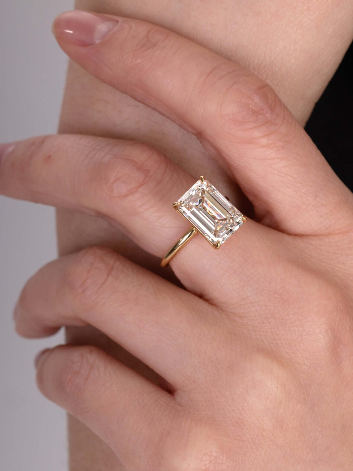 Top-down shot of Jude ring highlighting step-cut brilliance and symmetry