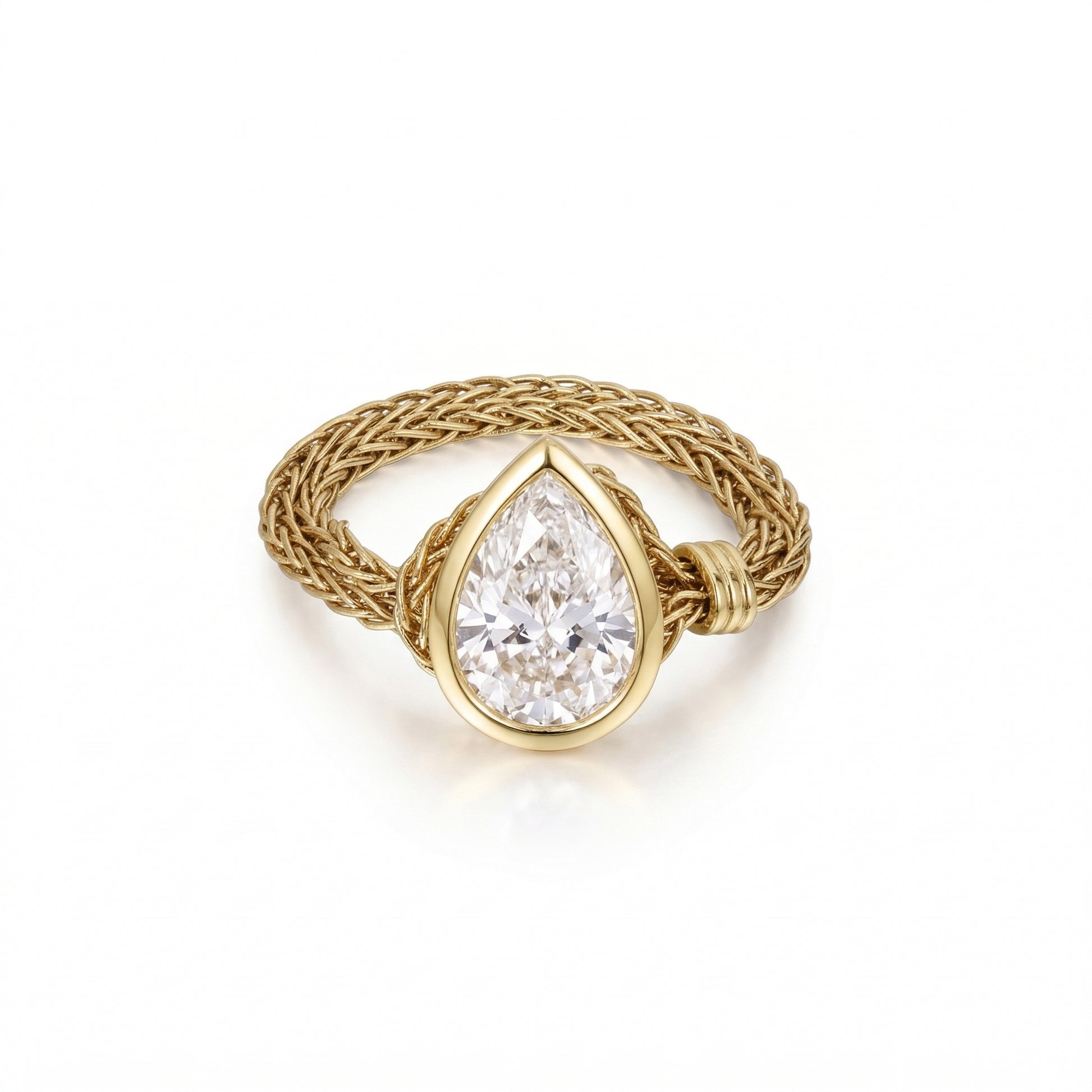 Faith-Pear Cut Lab Grown Diamond Engagement Ring with a pear cut diamond in a woven gold band.